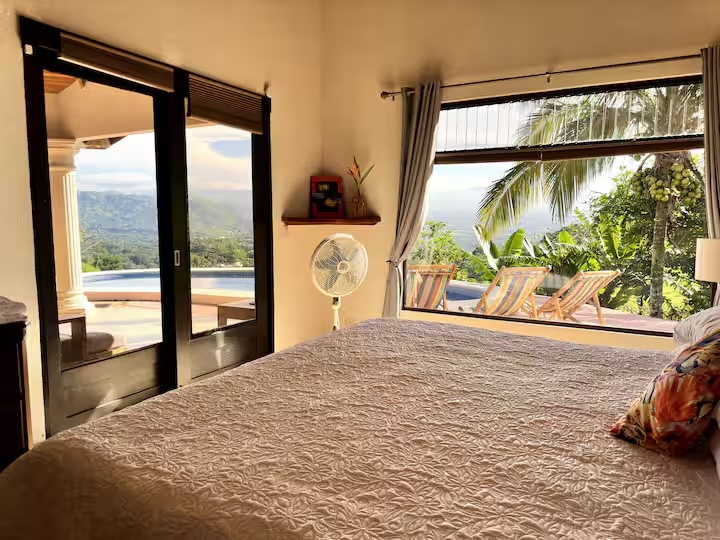 The luxury room with a king bed facing the pool and valley
