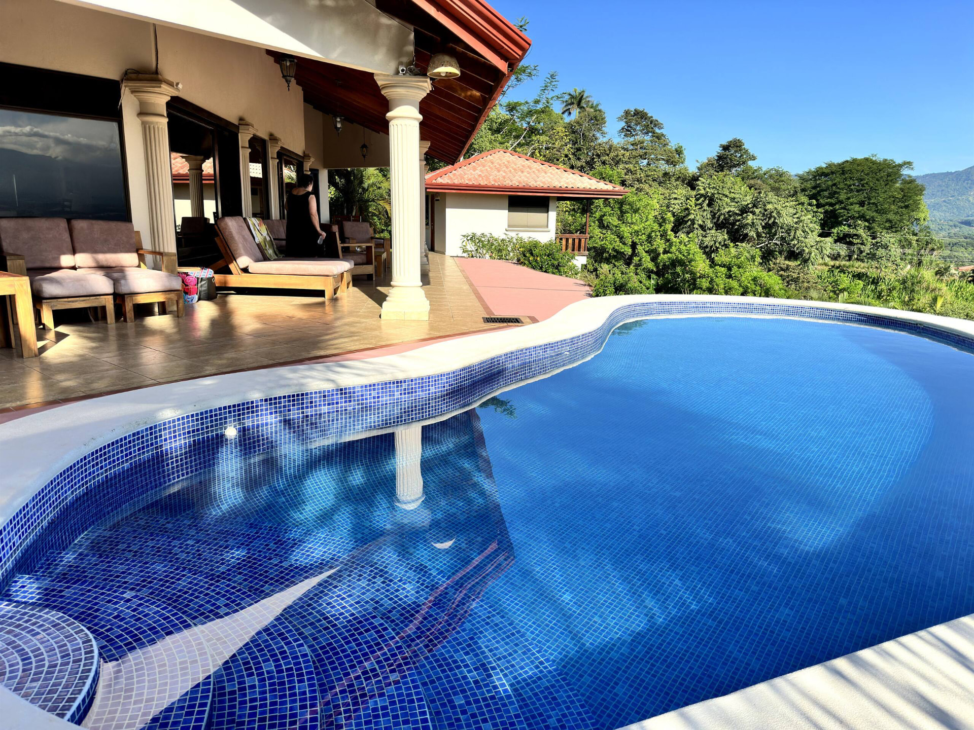 The main house terrace and pool looking out over the valley
